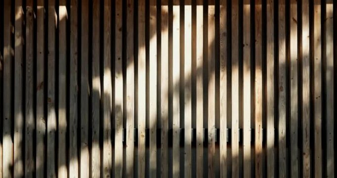 minimalist background of vertical wooden slats with diagonal sunlight and shadows. generated with AI