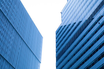 Modern Blue Glass Office Buildings with Minimal Sky and Copy Space