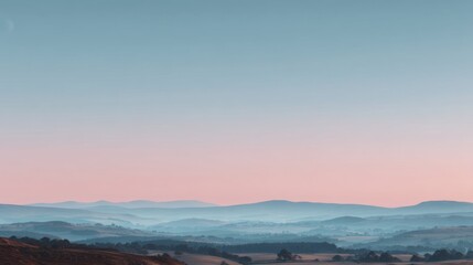 Serene Landscape at Dawn with Soft Pastel Skies Over Rolling Hills and Distant Mountains Under Gentle Light of Early Morning