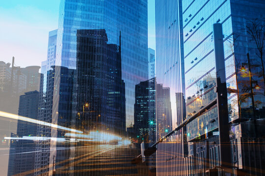 Modern City Double Exposure with Light Trails &ndash; Urban Business and Technology Concept