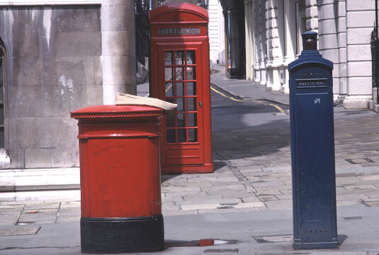 Red Post Box, Telephone Box and Police Call Post on Fleet Street, London c 1985