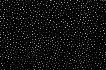Black fabric with white polka dot pattern © Alena Vilgelm