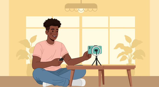 Man recording video on camera in a room with a window and plants in the background