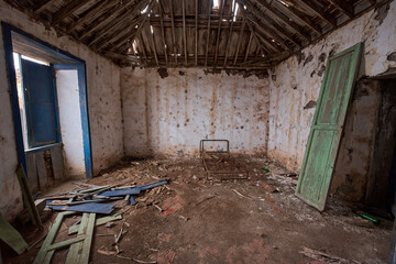 Obraz premium Derelict room with iron bed Hacienda Las Palmas