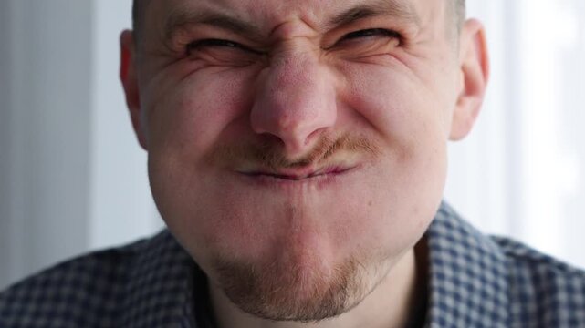 The man took a deep breath.
A mouthful of air.
Holding his breath.
