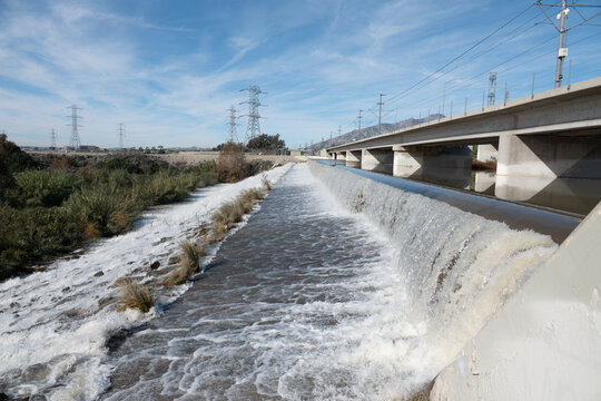 The San Gabriel River flowing under the 210 freeway near Azusa in Los Angeles County California. 