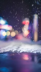 Naklejka premium Dreamy winter cityscape glows softly under falling snow a serene night scene