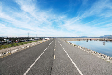 Bicycle path on top of Santa Fe Dam in Los Angeles County, California.  