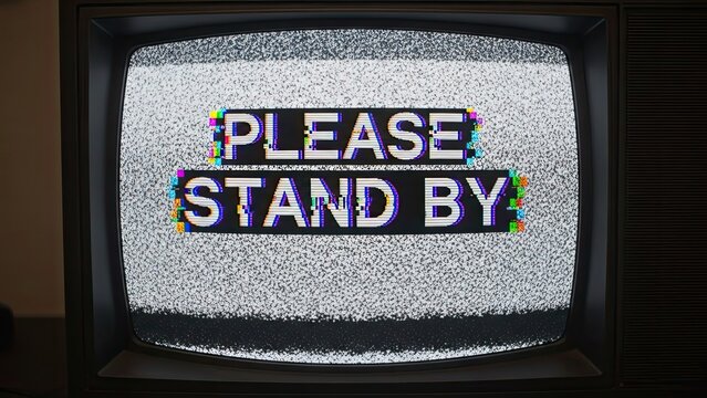 Vintage television screen displaying static and a retro 'please stand by' message