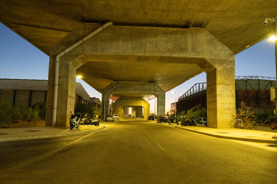 Concrete viaduct underpass at dusk, C&aacute;diz, Andalusia, Spain