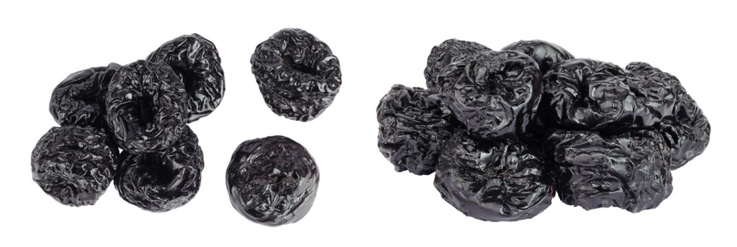 Prunes isolated on white background, heap of dried plums. Top view. Flat lay