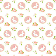 Cute Easter seamless pattern. White bunnies in pink medallions with spring flowers. Sweet nursery background for baby girl textile, wallpaper, and gift wrap. Elegant flat vector illustration