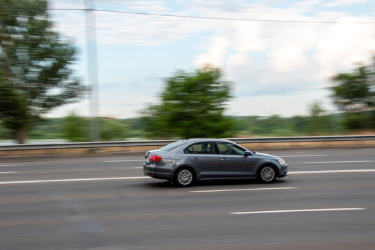 Ukraine, Kyiv - 29 July 2021: Gray Volkswagen Jetta car moving on the street. Editorial
