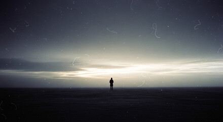 Solitary Person Standing on a Desolate Horizon Under an Overcast Sky