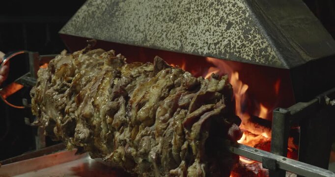 Traditional Cag Kebab Roasting Over Wood Fire