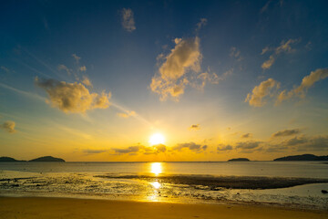 Landscape view of majestic clouds in the sky sunset or sunrise over sea with reflection in the tropical sea,Beautiful cloudscape scenery,Amazing light of nature Landscape nature background