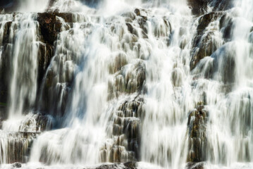 Fototapeta premium Dynjandi Waterfall Cascading Down Rugged Cliffs in the Westfjords of Iceland