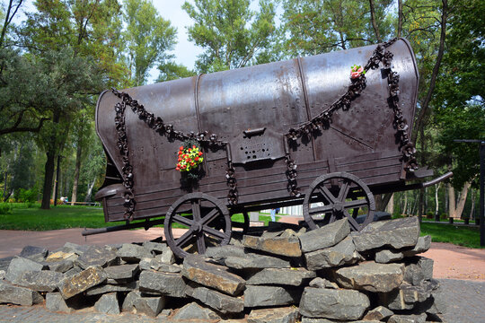 KIEV UKRAINE 09-04-17: Monument "The Gypsy wagon" in memory of the victims of the Roma Genocide from 1941 to 1943, opened September 23, 2016.