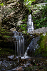 Fototapeta premium little waterfall cascade slow motion falling water