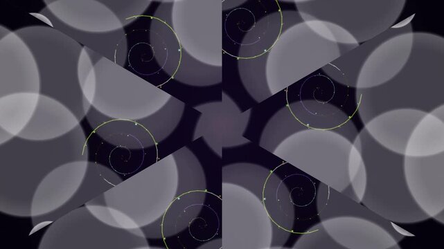 Geometric pattern of overlapping gray circles on dark background viewed from directly above
