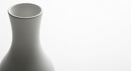 Elegant White Ceramic Vase Close-up with Minimalist Soft Shadow Background
