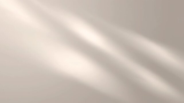 Dynamic abstract light rays and soft shadows slowly moving across a textured beige wall surface, creating a calming background.