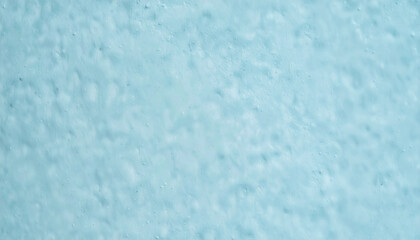 Obraz premium Textured light blue background with rough and bumpy surface structure. Abstract pale cyan paint or plaster texture suitable for wallpaper and design elements.