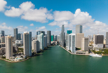 Naklejka premium Aerial view of Brickell skyline in downtown Miami. Modern skyscrapers rise above Biscayne Bay. Scenic panorama of Miamis financial district.