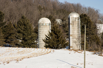 Grain silos on a farm in winter © Brian