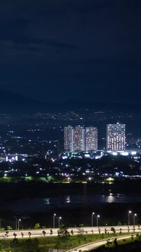 Vertical video - Timelapse of a night view of Jakarta outskirt (BSD)