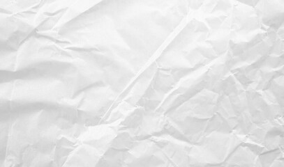 White wrinkled paper texture background. This crumpled paper surface is ideal for use as a backdrop or abstract texture in branding