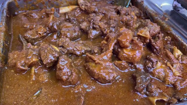 Bengali-style mutton kossa prepared with Indian spices