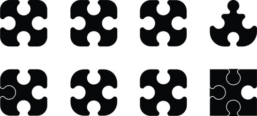 Fototapeta premium Collection of Black Silhouette Puzzle Pieces Showing Interlocking and Incomplete Forms Keywords: puzzle, jigsaw, piece, interlocking, connection