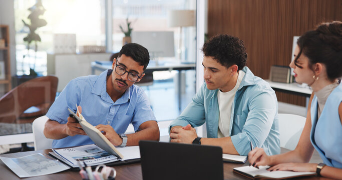 Business, team and meeting with notebook in office for article pitch, story ideas or editorial planning. Journalists, people and discussion with notes in newsroom for creative advice or news feedback