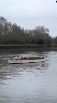 MV Zephyr vessel moored at Putney on the River Thames currently listed for sale featuring traditional marine design and historical character in a prime London waterfront location