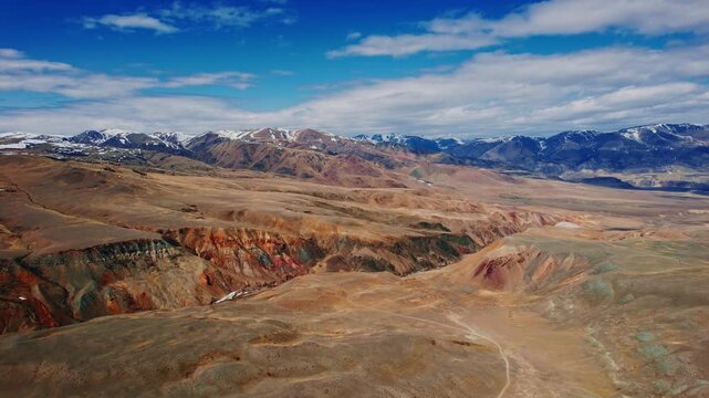 Multicolored geological shades of clay in Altai Republic, Russia. Martian landscape Mars 2 in Chui steppe, Gorny Altay drone view.