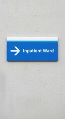 Obraz premium Hospital Sign Directing Patients to Inpatient Ward With Clear Directional Guidance