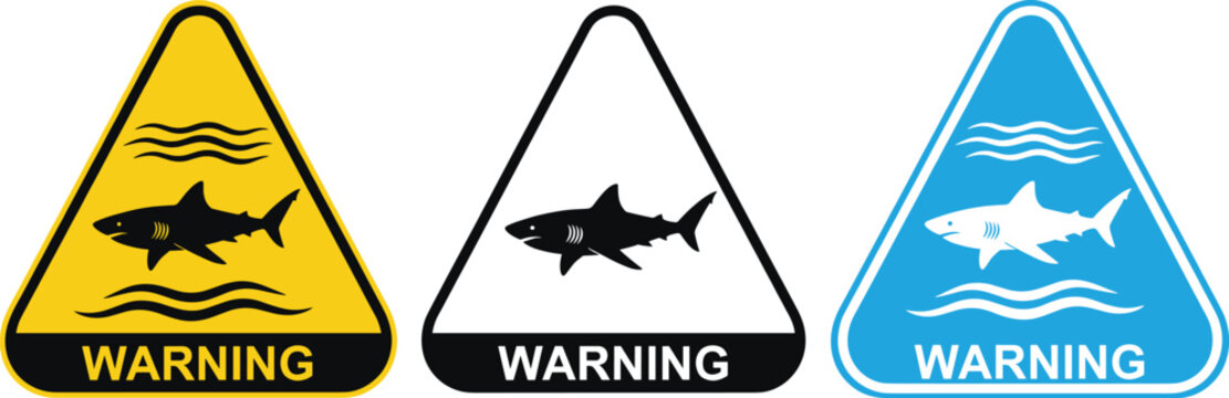 Shark warning sign icon set with fish silhouette and text in yellow, black, and blue triangle styles