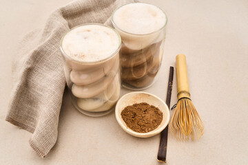 Hojicha lattes with roasted green tea powder and whisk