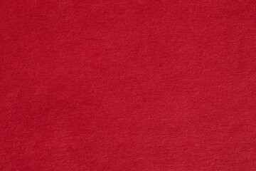 red paper background © Nicole Kandi