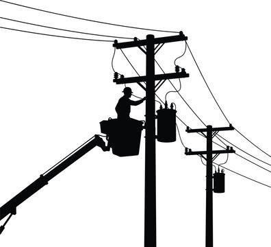 Silhouette of worker in bucket truck servicing electrical transformer on power pole lineman power line