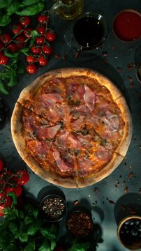 Rotating Fresh Pizza Capricciosa, Endless Loopable Slow Motion Shot.