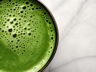 macro top down glass of hot green tea on background