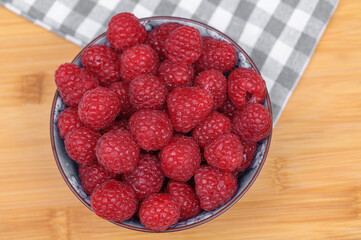 Fresh raspberries picked straight from the garden in summer