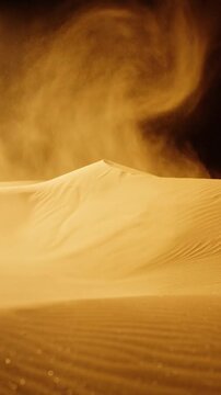 Golden sand dunes with wind blowing dust against a dark background