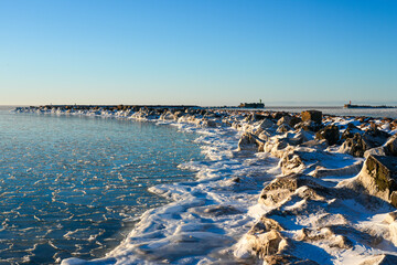 Frozen Baltic Sea at Liepaja Harbor Gate Breakwater in Latvia Winter Seascape © Zigmunds