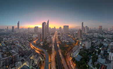 Aerial view of Bangkok city. Skyscrapers Buildings over financial business district. Asian tourist travel attraction city skyline, Traffic and transportation.