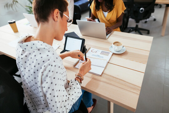 Woman working at desk in office