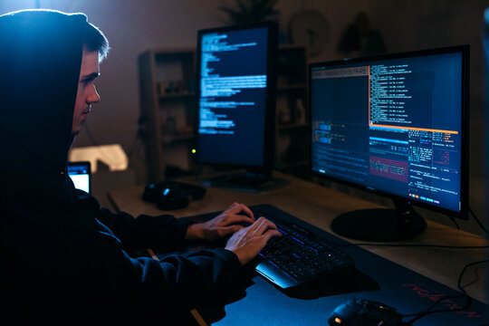 Young man using computer while working at table