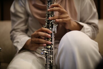 Close Up of Musician Playing Oboe © maha